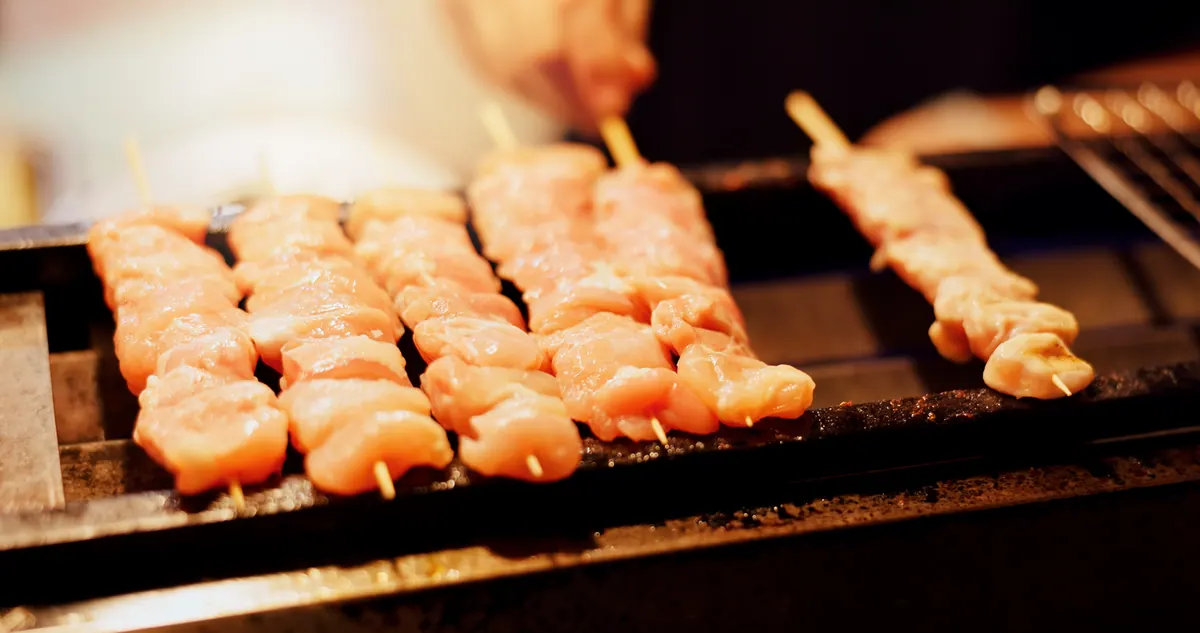 Skewers finishing over binchotan charcoal
